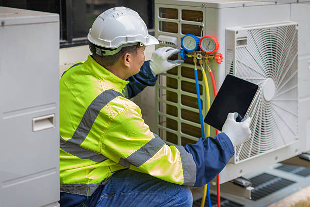 Professional Air Duct Cleaning technician working in Branford, CT